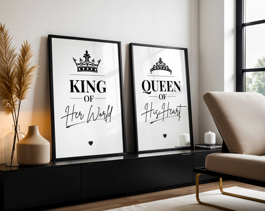 Two framed black-and-white wall art prints leaning against a light wall in a modern living room. The left print reads “KING Of Her World” with a crown graphic, and the right print reads “QUEEN Of His Heart” with a tiara graphic.
