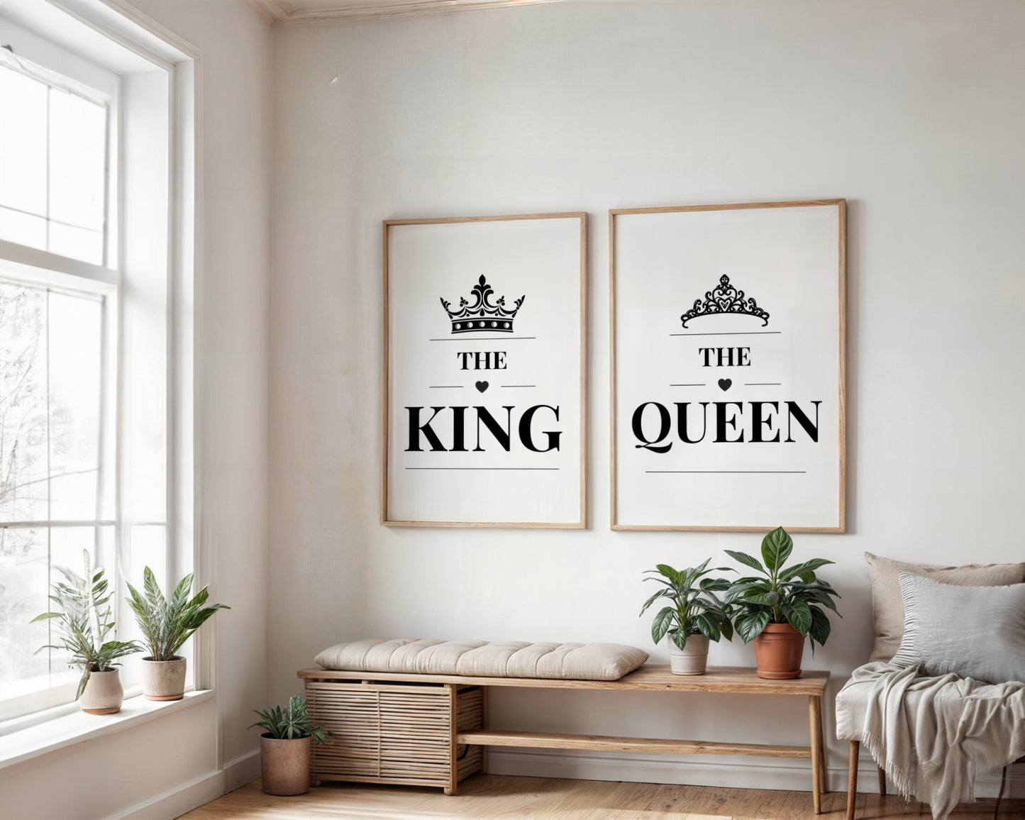 Two framed wall art prints hanging above a bench in a bright room. The left print says “THE KING” with a crown above, and the right print says “THE QUEEN” with a tiara above.