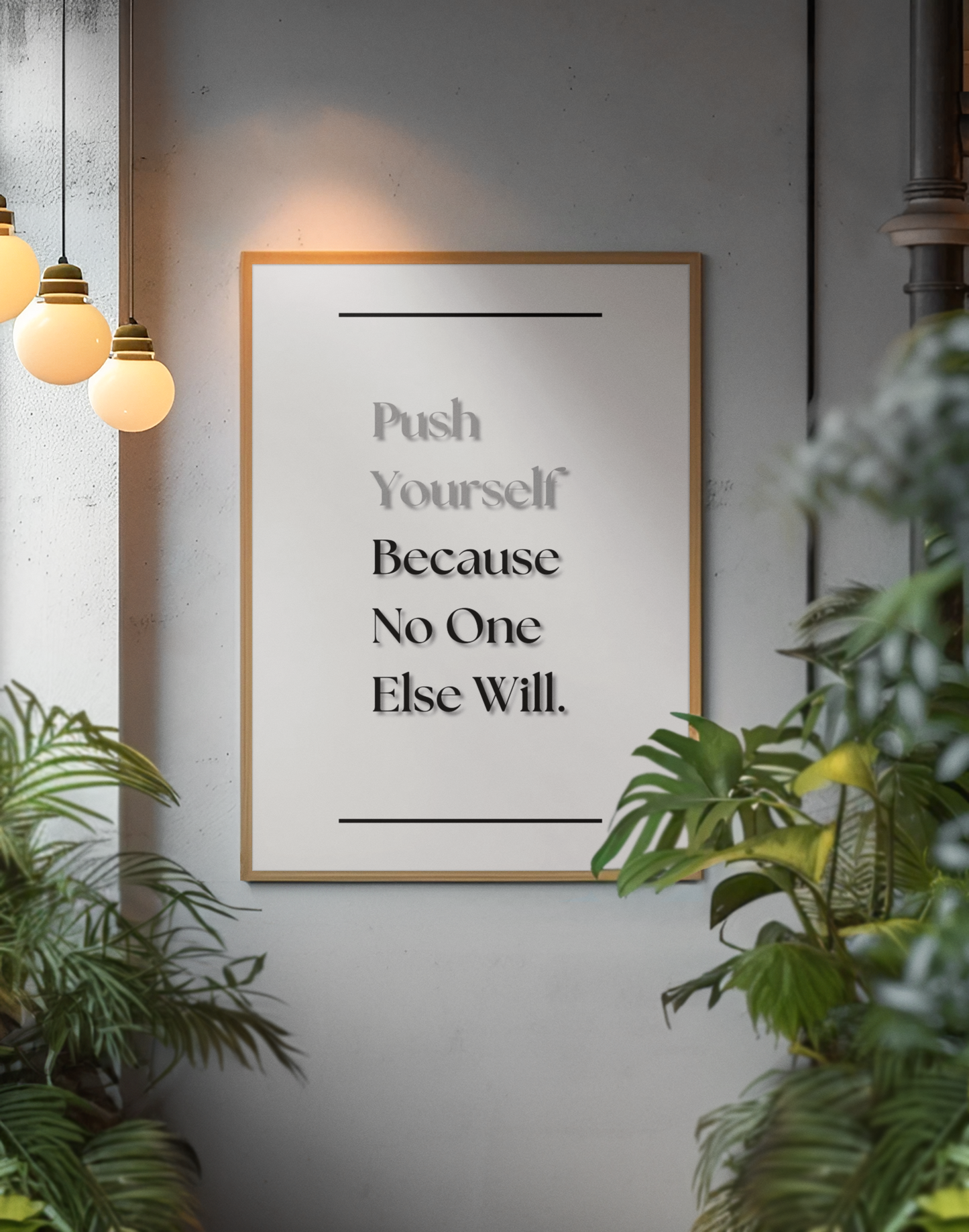 A framed motivational poster with the text 'Push Yourself Because No One Else Will.' hanging on a gray wall in a modern interior setting with hanging pendant lights and green plants.