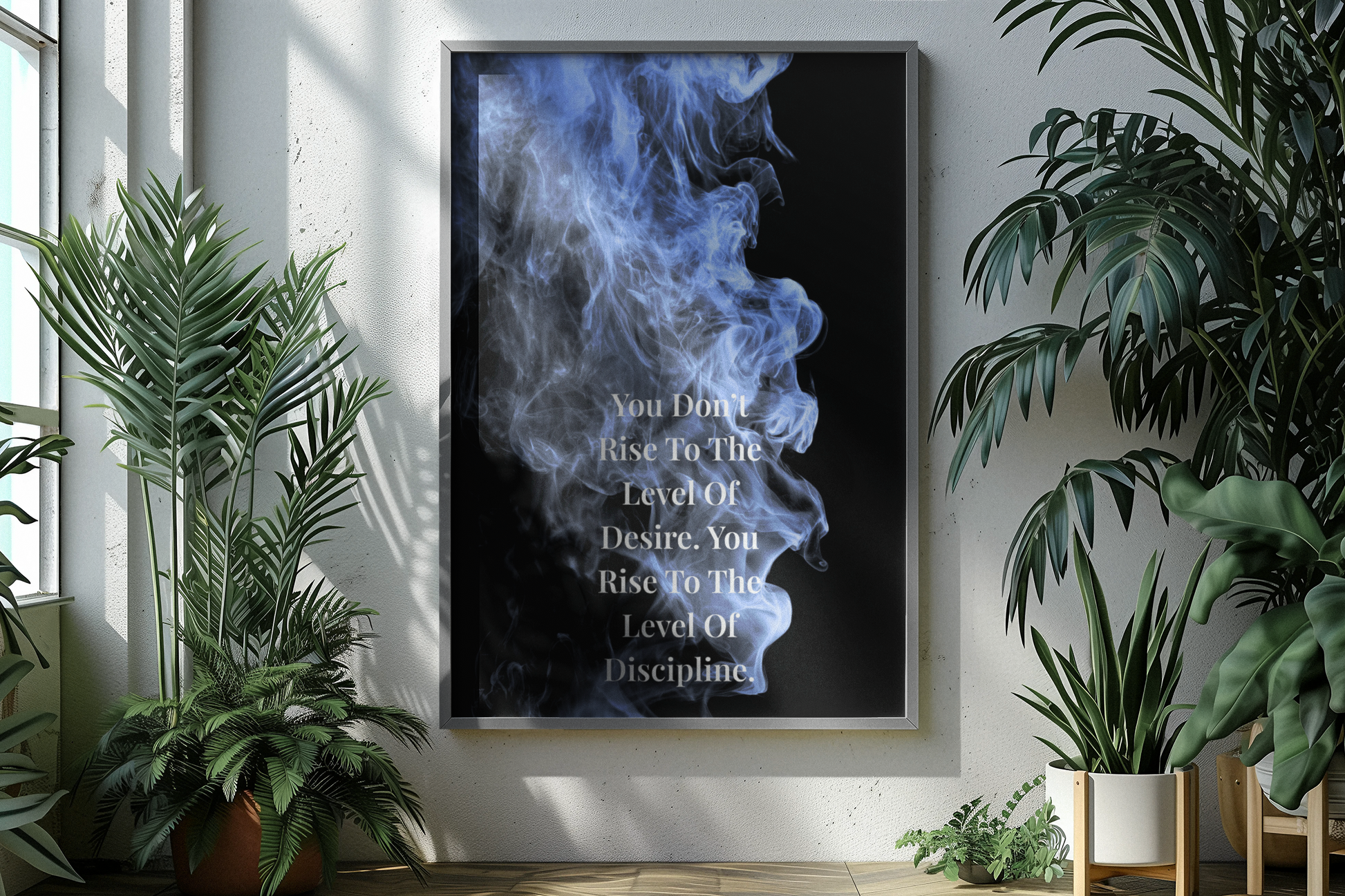 Big typography smoke print in blue on a white wall with indoor plants.