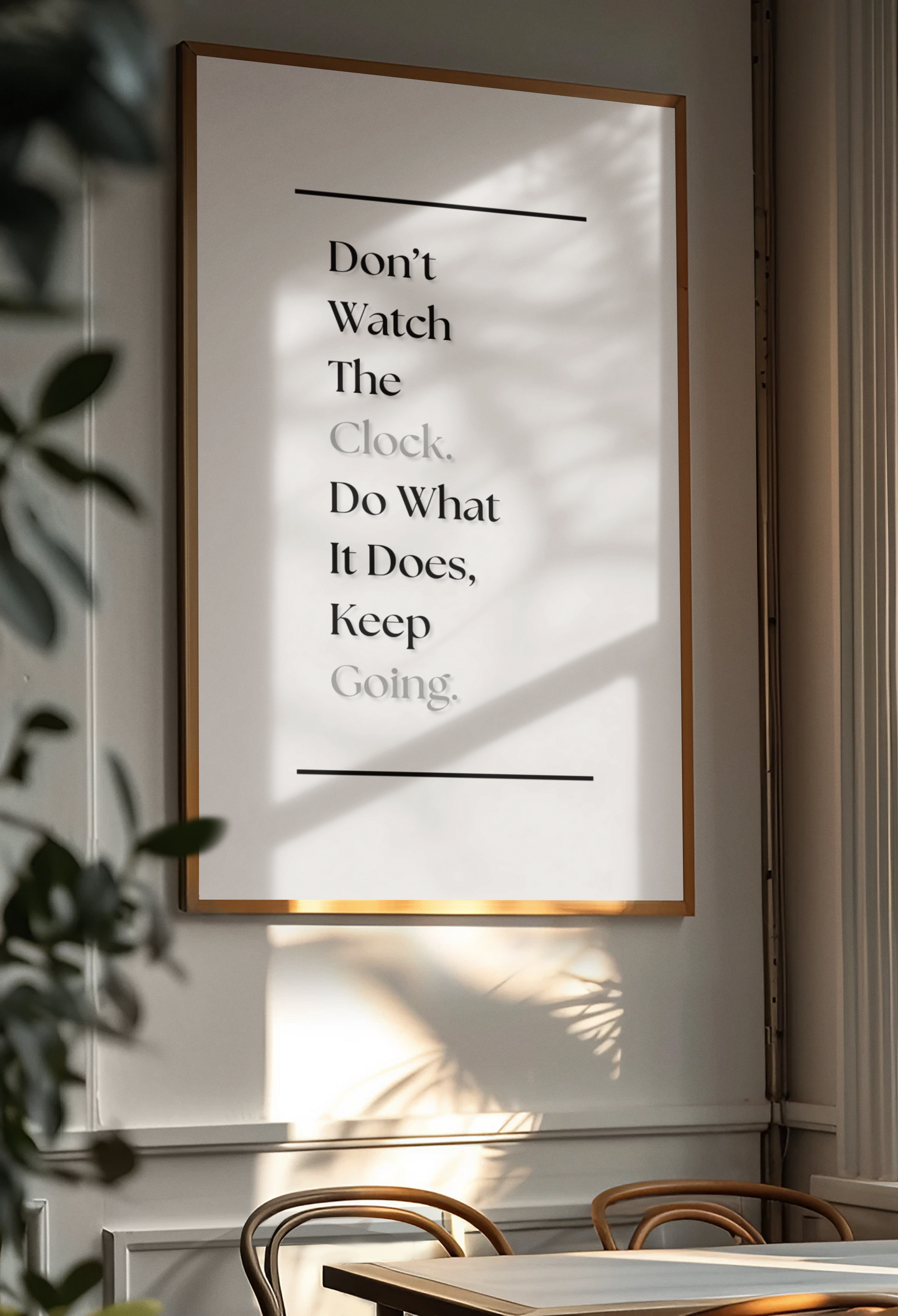 A framed motivational wall art print with the quote 'Don't Watch The Clock. Do What It Does, Keep Going.'