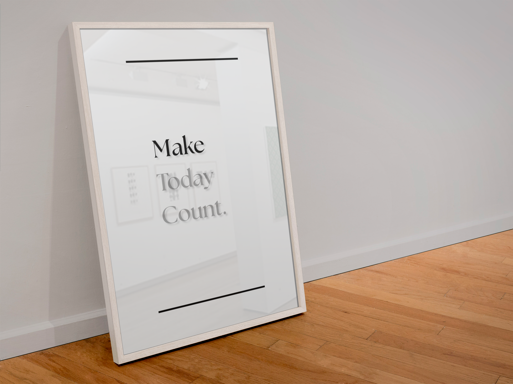 A framed minimalist art print leaning against a white wall on a light wood floor. The print features the text 'Make Today Count'.
